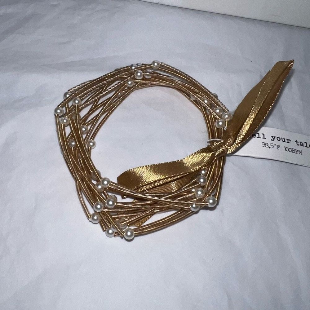 Tell Your Tale Guitar String Gold Tone With Faux Pearl Bracelet Set